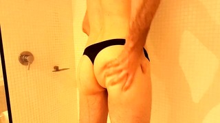 Young fit guy in thong cumming from vibrating bullet
