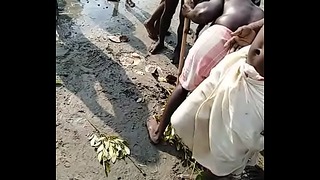 Almost Naked Hindi Natives Performing Rituals