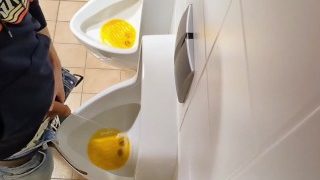 Amateur Guy Pissing At Public Urinal