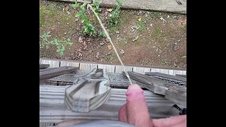Amateur Guy Pissing Off Porch In Public