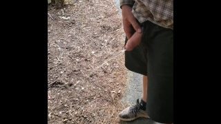 Boy Peeing Outside Cabin