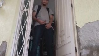 Boy Wearing Jeans Peeing Out Before Going Outside