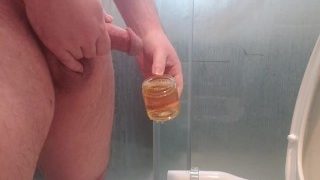 Chubby Boy Pissing In A Jar For A Fan