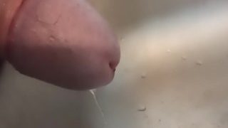 Close Up Of Cock While Pissing In The Sink