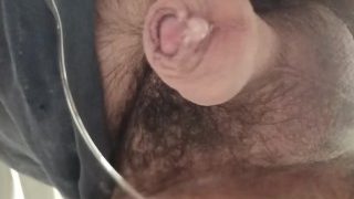 Close Up Of Uncut Cock With Foreskin. POV Under A Glass