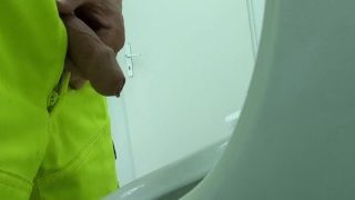Construction Worker Pissing At Work, Close Up