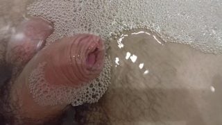 Enjoy Pissing Inside Water With Foam. Uncut Close-Up Cock