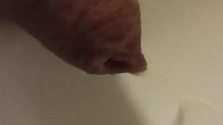 Extreme Closeup Pissing Uncutted Cock.