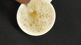 Filling Up A Cup With Piss