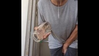 Glass Full Of Piss And Spit Being Trhow Out On The Floor
