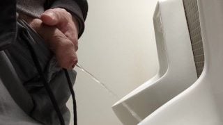 Guy Piss At Public Toilet