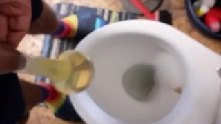 Having Fun Pissing In Condom