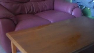 John Is Sitting On The Sofa And Is Pissing On The Table