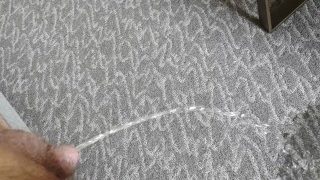 Laying On Couch Pissing On Floor In Hotel Room