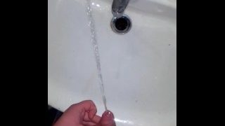 Man Moans During Piss