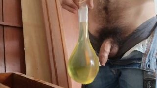 Man Peeing Inside A Condom, Filling It Up