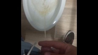 Peeing In A Bathroom Stall