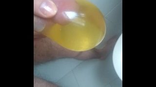 Peeing Into Condom