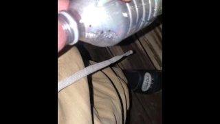 Pissing Outside In Bottle