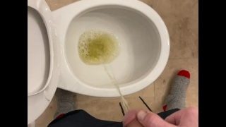 Taking A Yellow Piss While Working On A House