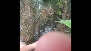 Teen Cums Into The River While Naked In The Forest