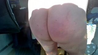 bending over and spanking and smoking and standing, sunbathing
