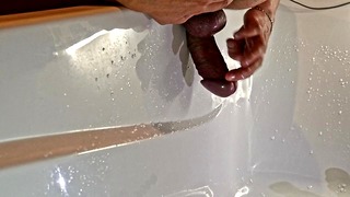 Man experiments in the bath, squirts during prostate massage, pees right on camera and cums