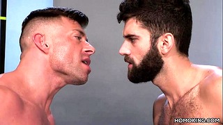 Strong Men Sharing The Ass Of A Bearded Dude